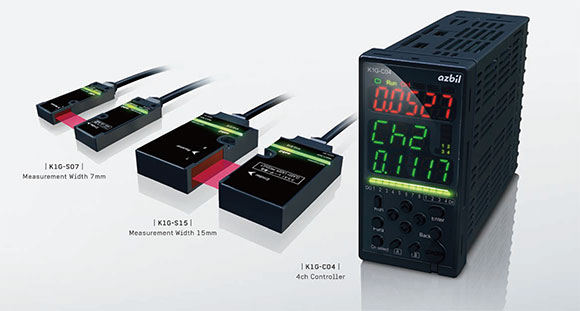 Exterior of the high-accuracy position sensors: the emitter and receiver of the 7mm measurement width model (left) and of the 15mm measurement width(center), and the controller (right)