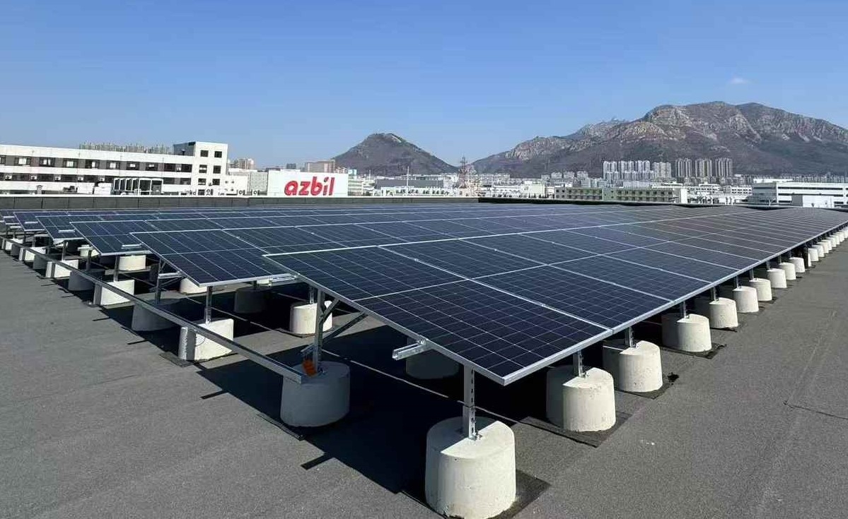 Solar panels on factory rooftop